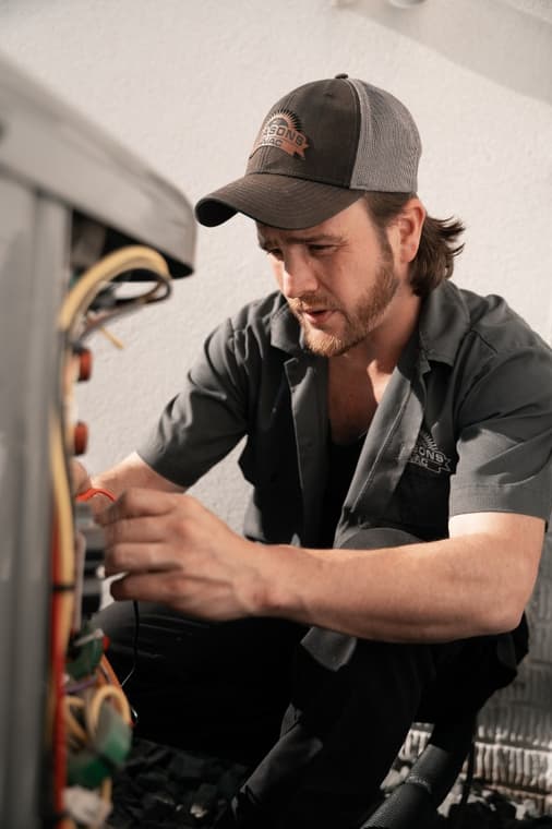 An All Seasons HVAC team member at work